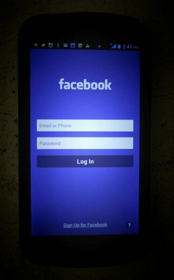 A mobile phone screen showing a Facebook log in