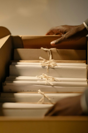 A box of files tied with calico ribbons